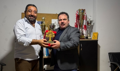 OSMAN SEYREK’E PLAKET VE MİLLİ FORMA SÜRPRİZİ